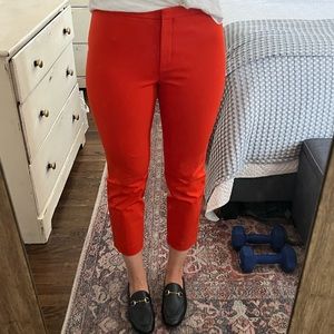 Theory classic skinny pants, in the color Fire Opal. Never been worn.